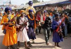 sikhs converge at anandpur sahib for hola mohalla