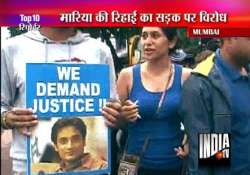 supporters of slain neeraj grover hold protest rally