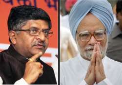 2g bjp targets pm congress says don t jump the gun