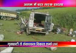 31 people dead as truck hits two vans in assam