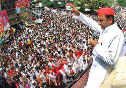 akhilesh slams bjp for copying poll manifesto