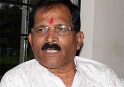 bjp mp in trouble for posing with bible in goa