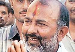 former bsp minister held for role in scam