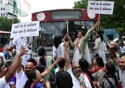 congress workers hold agitations against suspension of mps in gujarat