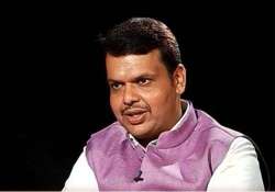 fadnavis unveils slum redevelopment plans for mumbai