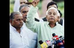 govt saving modi to ensure n bill passage allege lalu mulayam