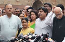 bjp mps meet prez submit crores of signatures on price issue