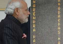 modi s pinstripe suit let pm explain gift ethics says congress