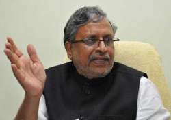 sushil modi dares bihar govt to lodge case against him