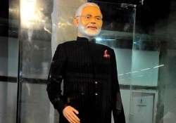 shiv sena defends modi on auction of monogrammed suit