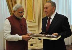 pm modi holds talks with kazakhstan president gifts him books on religions born in india