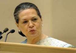 sonia congratulates manmohan for japanese award