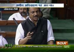 opposition creates uproar in lok sabha over land bill