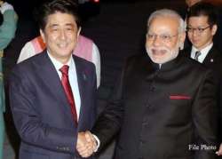 pm modi congratulates shinzo abe on his victory in elections