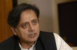 tharoor plunges into sanitation drive invokes gandhi to silence critics