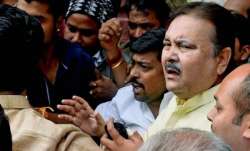 madan mitra brought to alipore court amid statewide protest by trinamool congress