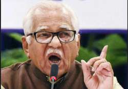 governor ram naik acting like rss worker samajwadi party