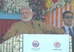 modi slams opposition for blocking passage of land bill in rs