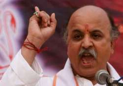 ban on togadia karnataka bjp members stage walkout