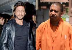 bjp mp yogi adityanath attacks shah rukh khan compares him with hafiz seed