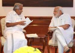 cm oommen chandy slams raid at kerala house writes to pm modi seeking action