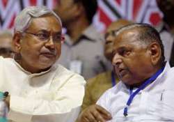 amid confusion over merger nitish asks mulayam to call meet