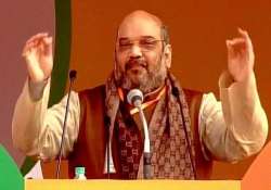 bringing back black money complex issue says amit shah