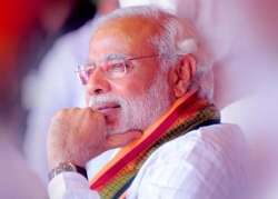 congress cries foul over narendra modi s radio talk complains to ec