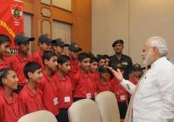 pm modi meets children from jammu and kashmir in delhi