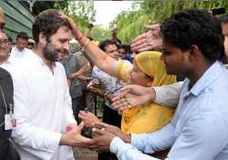 rahul gandhi meets sanitation workers for the second day