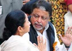 mamata banerjee accuses bjp of harassing her confidante mukul roy