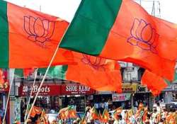 delhi polls bjp directs workers to ensure uniformity on posters slogan