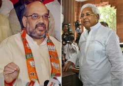 lalu yadav amit shah booked for use of abusive words