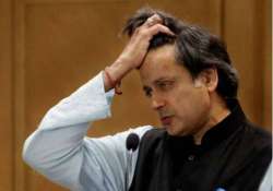 congress daily takes potshots on tharoor for praising modi