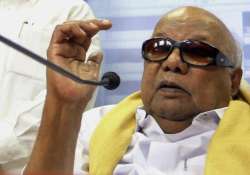 dmk chief slams bjp over re promulgation of land acquisition ordinance