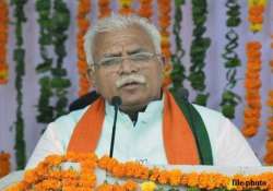 pm congratulates khattar on taking oath as haryana cm