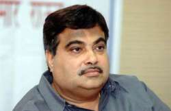 sonia modi both work for poor says gadkari