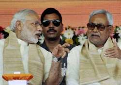 nitish writes open letter to modi asking him to withdraw dna comment