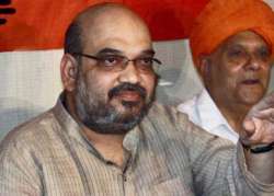 muzaffarnagar court refuses to take cognizance of chargesheet against amit shah