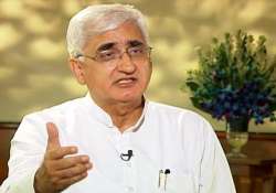 khurshid takes a dig at team anna