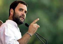 live rahul mocks modi over gujarat toffee model of development