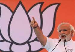 modi quits vadodara retains varanasi