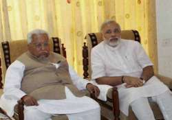 modi seeks keshubhai patel s blessings after poll win