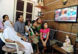 namo s family still awaiting the invitation as india gets excited over modi s swearing in