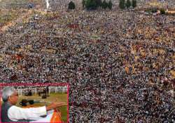 nitish kumar flexes his muscles at patna gandhi maidan rally