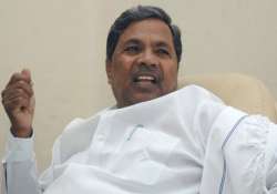 protests in karnataka over denial of ministership