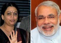 modi files nomination at vijay mahurat congress fields suspended ips officer s wife against cm