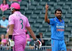 dhoni blames bowlers for crushing defeat