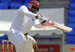 gayle strikes 150 powell 134 against kiwis