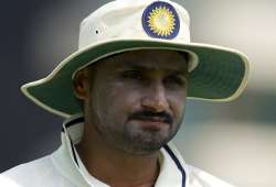 harbhajan singh s absence hurting india akram